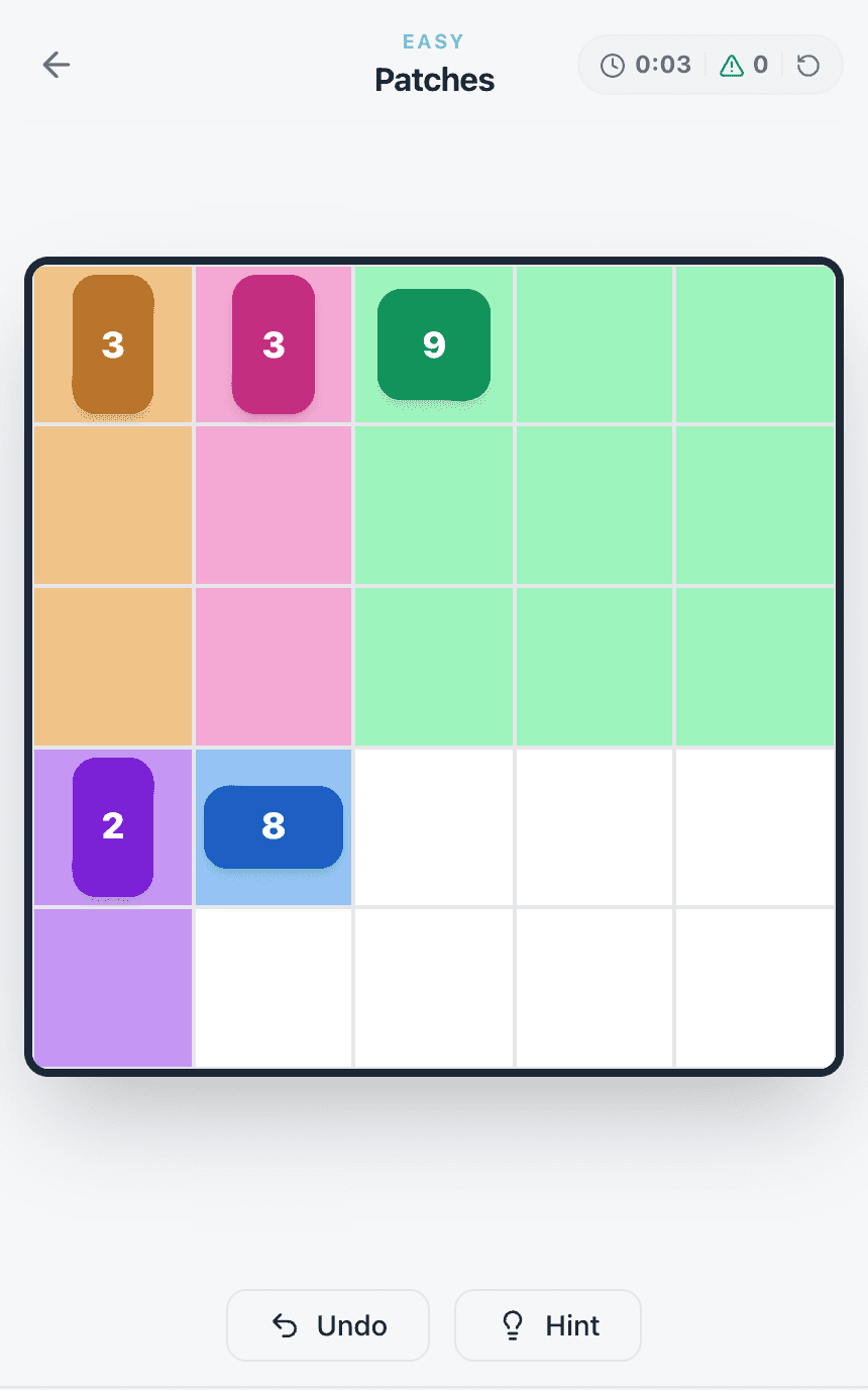 The Patches board with four rectangles drawn and a white block four cells wide and two cells high left around the 8 clue.