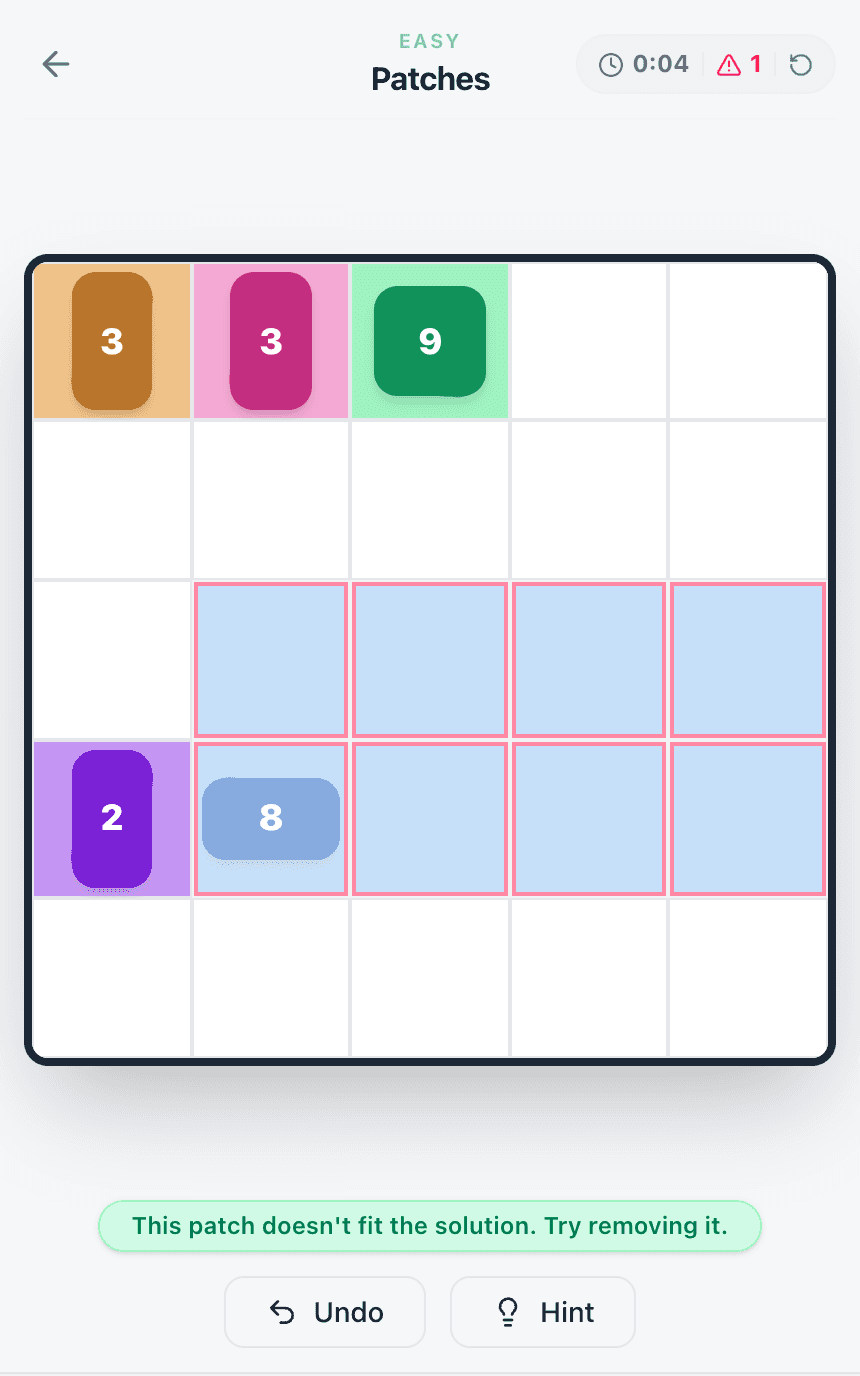 The Patches hint highlighting the misplaced 8 rectangle with the message: This patch doesn't fit the solution. Try removing it.